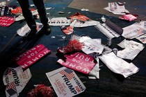 Debris and signs are left on the floor after the victory party for Republican president-elect Donald Trump in New York on November 9, 2016.