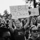 Abortion-rights demonstrators hold signs during a protest outside the U.S. Supreme Court in Washington, D.C., U.S., on Tuesday, May 3, 2022.