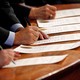 North Carolina Electoral College representatives sign the Certificates of Vote after they all cast their ballots for U.S. President-elect Donald Trump in the State Capitol building in Raleigh, North Carolina, U.S., December 19, 2016.