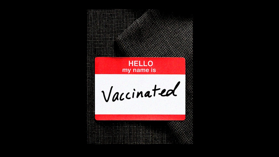 A name tag that reads "vaccinated"