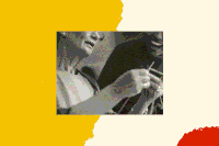 A black and white photo of two people knitting together.