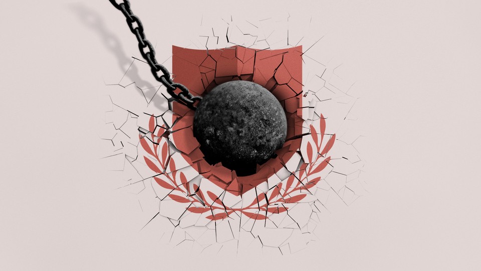 A wrecking ball smashing a shield motif.