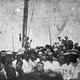 The lynching of James Reed, in Crisfield, Maryland, on July 28, 1907, for the alleged murder of the police officer John H. Daugherty. This image was modified for The Atlantic by the artist Ken Gonzales-Day, whose technique, as showcased in his "Erased Lynchings" project, is to digitally remove the victim from historical photographs of lynchings. By erasing the victims’ bodies, Gonzales-Day pushes the viewer to focus on the crowd and, by proxy, the racism and bias that were foundational to these acts of violence.