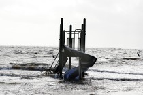 A playground slide stands surrounded by the storm surge of Hurricane Sandy, in Bellport, New York, in October 2012.