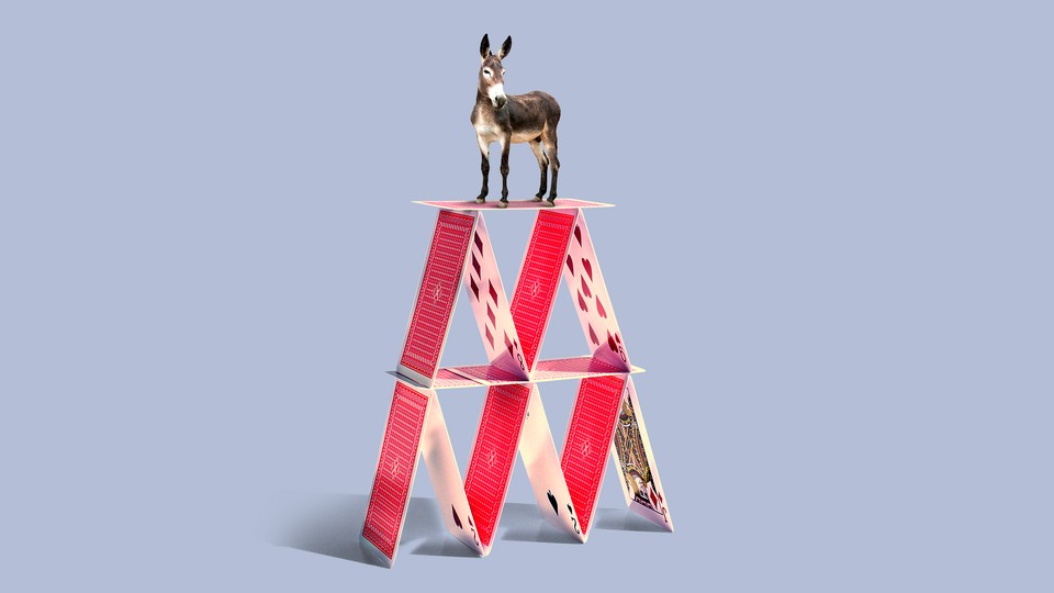 A donkey standing on top of a house of cards.