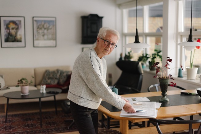 Lene Brrun looks through letters from her daughter in her home
