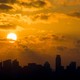 The sun rises over downtown Austin, Texas, on Friday, June 30, 2023.