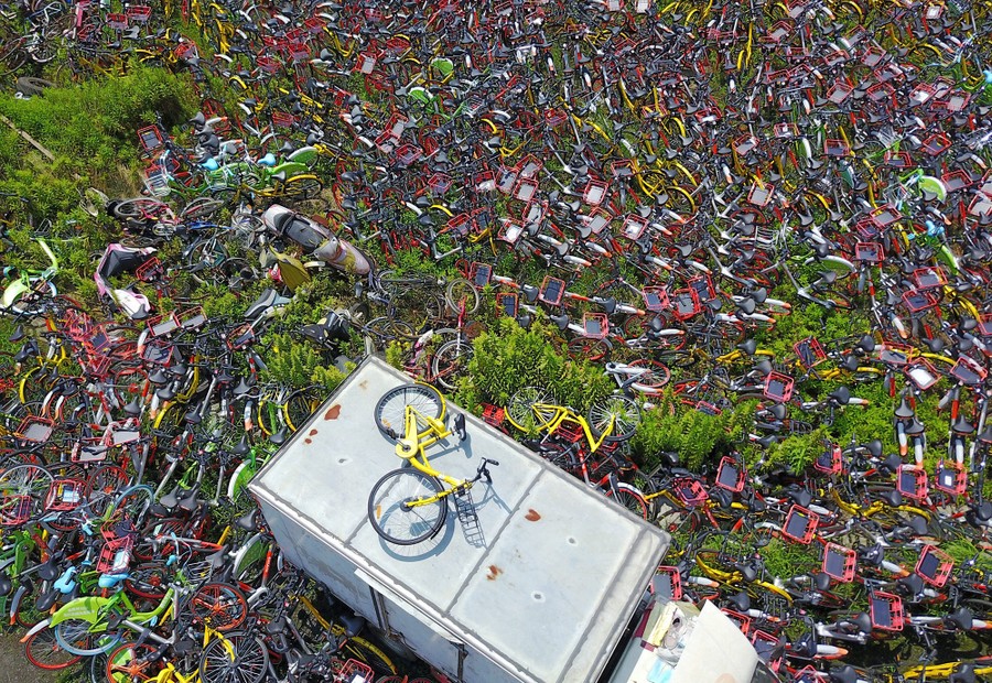 Bike Share Oversupply in China: Huge Piles of Abandoned and Broken 