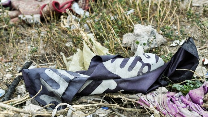 A discarded ISIS flag