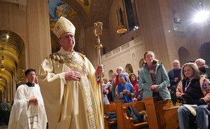 Archbishop Joseph Naumann processes through the Basilica of the National Shrine of the Immaculate Conception in Washington, D.C.