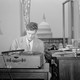 Robert Lowell at his desk
