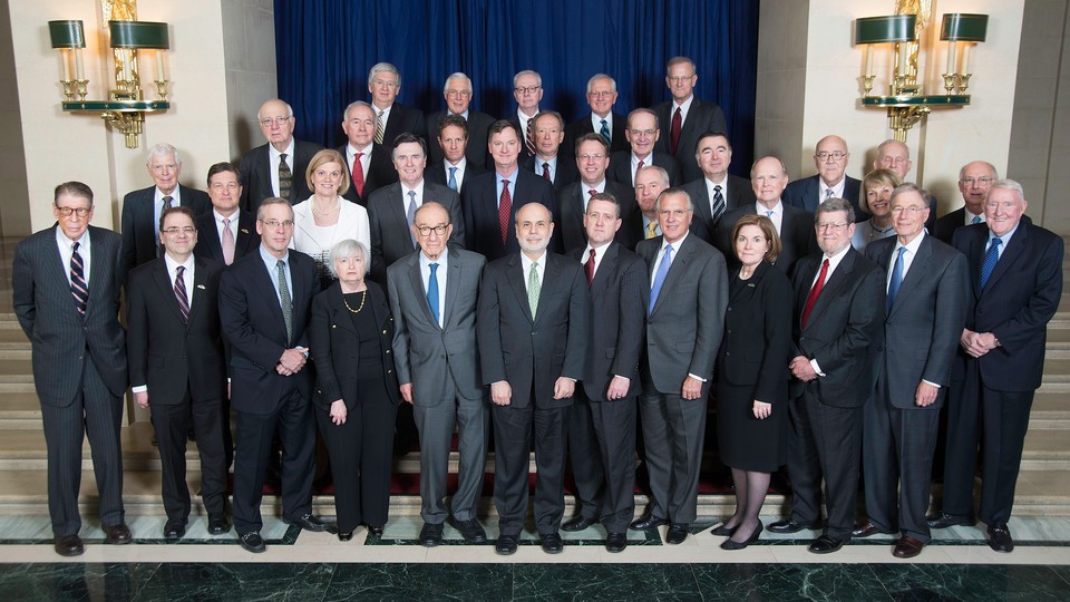 A group photo of current and former Federal Reserve Bank presidents in 2014