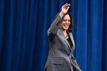 Grinning Kamala Harris greeting crowds