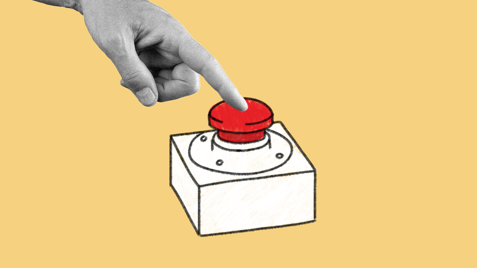 A hand on a button