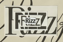 Photo of paper cut-outs of the word "rizz" layered on top of one another