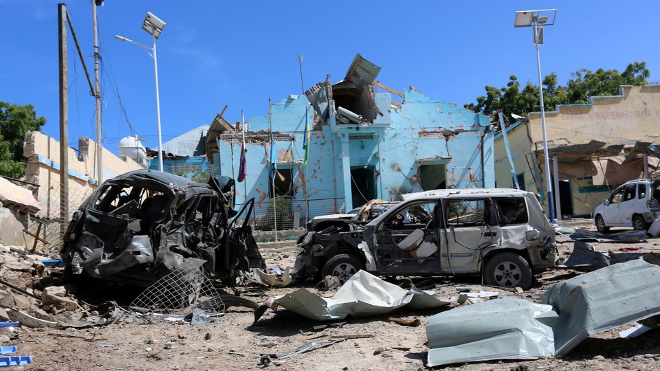 A view shows the destruction and wreckages of cars after the attack on June 20, 2017.
