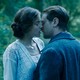 Emma Corrin and Jack O’Connell mid-embrace in "Lady Chatterley's Lover"