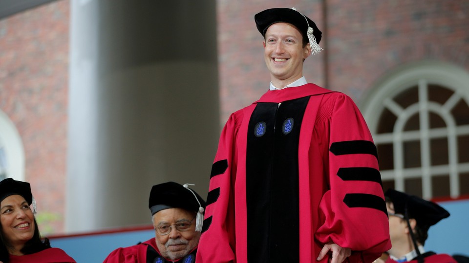 Mark Zuckerberg receiving an honorary diploma from Harvard.