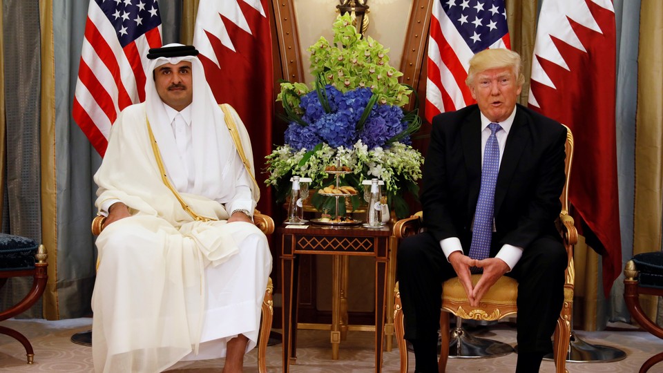 Qatar’s Emir Sheikh Tamim Bin Hamad Al-Thani meets with President Donald Trump Saudi Arabia on May 21, 2017. 
