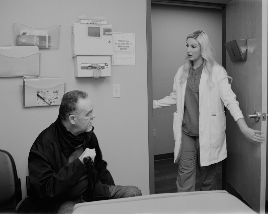 A doctor visits with a patient in The Health Wagon Office in Wise, Virginia on Tuesday, March 14, 2023. 