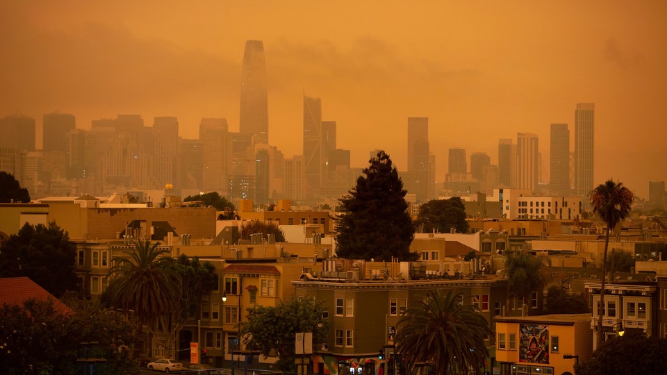 San Francisco with an orange sky, a result of the California wildfires.