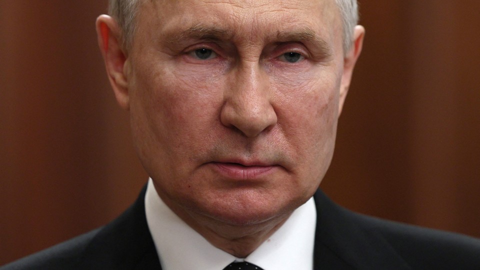 Putin looks concerned in a close-up photo.