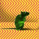 a green rat on a zig-zag background