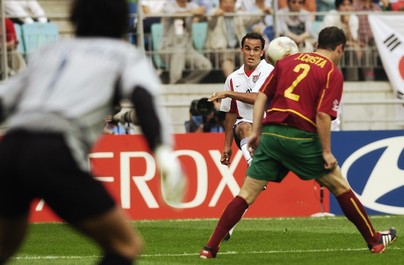 Landon Donovan crosses the ball as it hits the body of Jorge Costa of Portugal to record an own goal for the second goal during the first half during the Portugal v USA, Group D, World Cup Group Stage match played at the Suwon World Cup Stadium, Suwon, South Korea on June 5, 2002. 