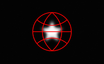 A blurry white star in a red sphere against a black background
