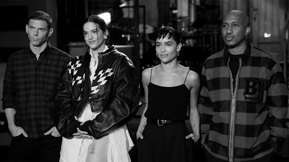 Mikey Day, musical guest Rosalía, host Zoë Kravitz, and Chris Redd stand next to one another during "SNL" promos on March 12, 2022