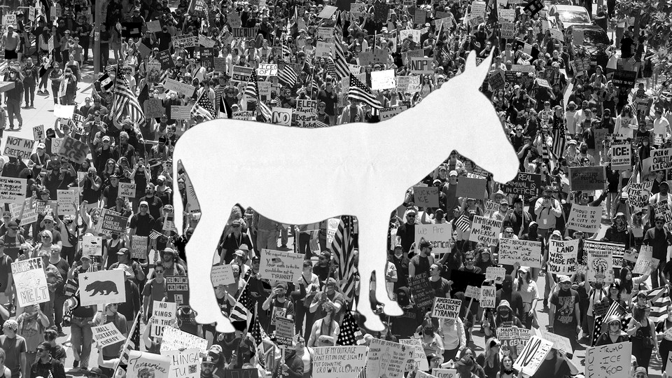 A donkey cutout in a photo of a No Kings protest