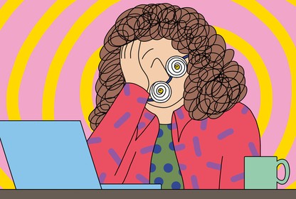A woman at her laptop feeling burned out