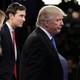 Donald Trump is flanked by his son-in-law, Jared Kushner, and his son Donald Trump Jr.