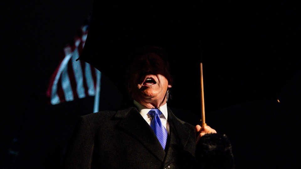 Trump in shadow holding an umbrella