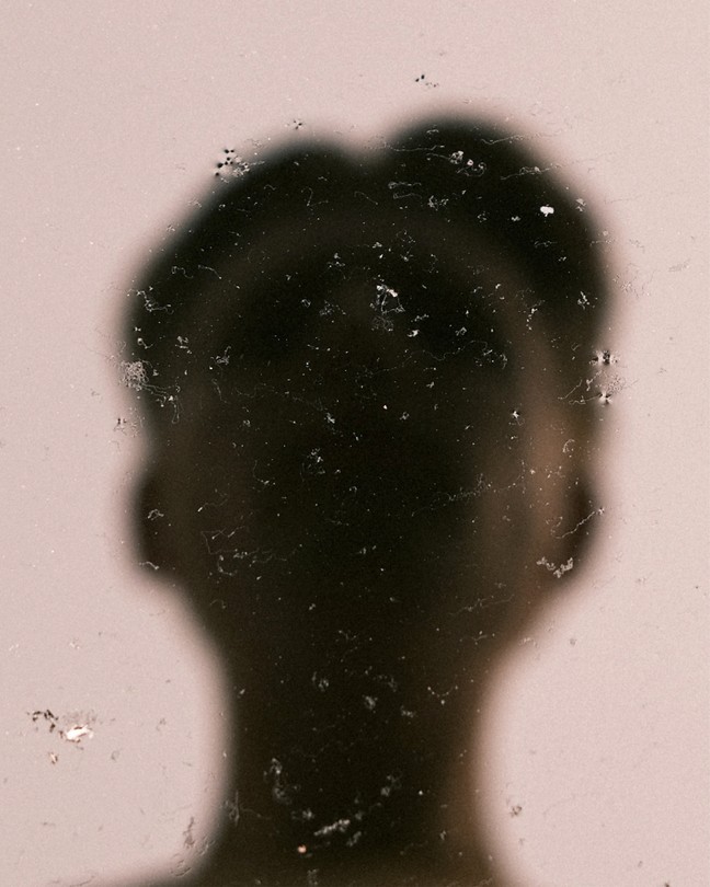 a blurry silhouette of a man