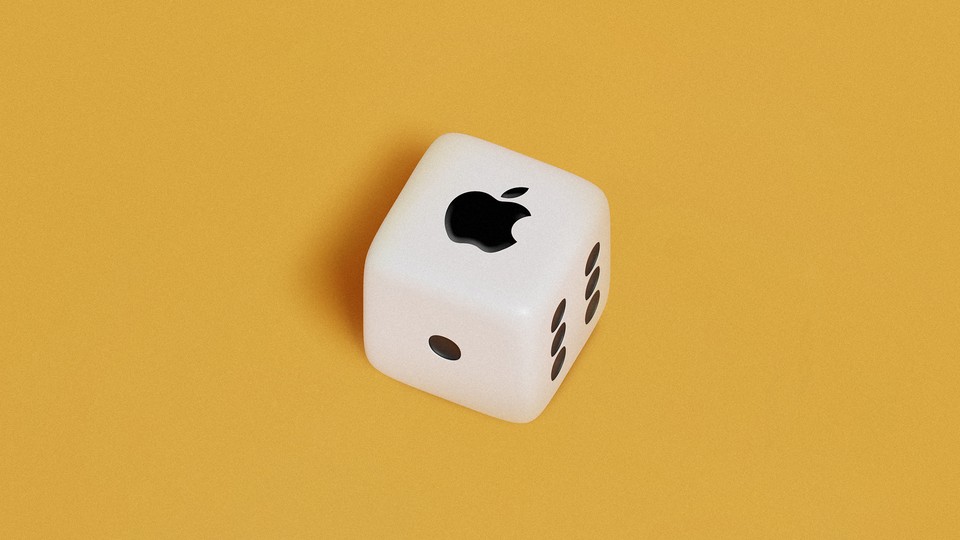 An image of a die with the Apple logo