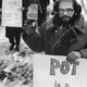 Allen Ginsberg leads a group of demonstrators outside outside the women’s House of Detention in New York City’s Greenwich Village advocating the use of marijuana. Ginsburg is shown carrying a sign “Pot is a Reality Kick.”