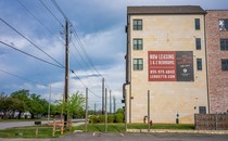 A photograph showing a building advertising apartments for lease on March 19, 2024, in Austin, Texas