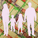 A silhouette of a nuclear family set against a map