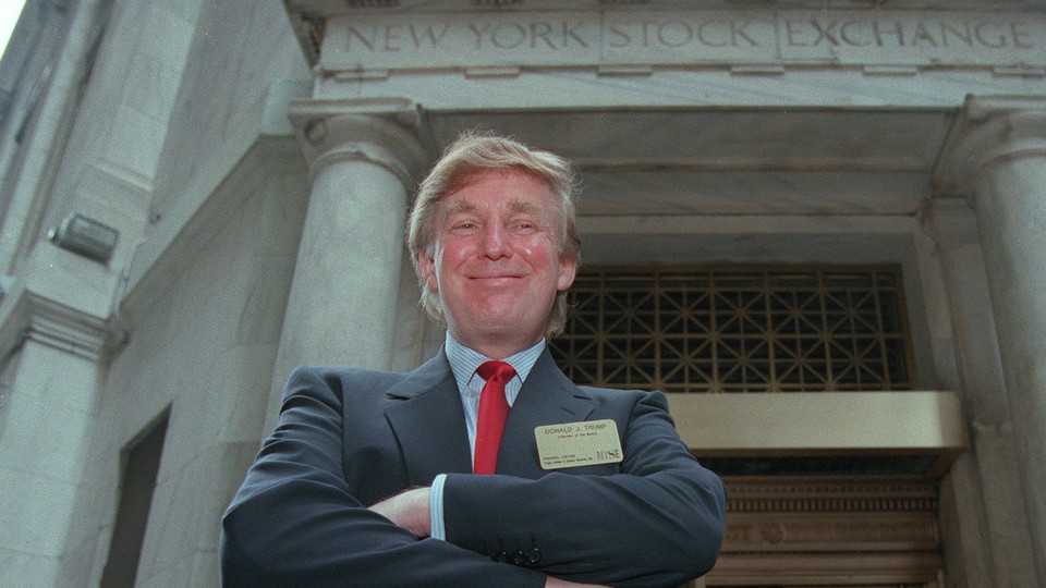 Donald Trump poses outside the New York Stock Exchange.