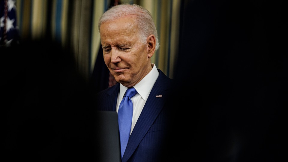 Picture of Joe Biden over a blurred background.