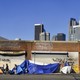 Tents housing homeless people line up in front of closed storefronts near downtown Los Angeles, California, on February 16, 2022.