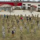 Photo of the Vermont National Guard in front of an expo center that they converted into a hospital