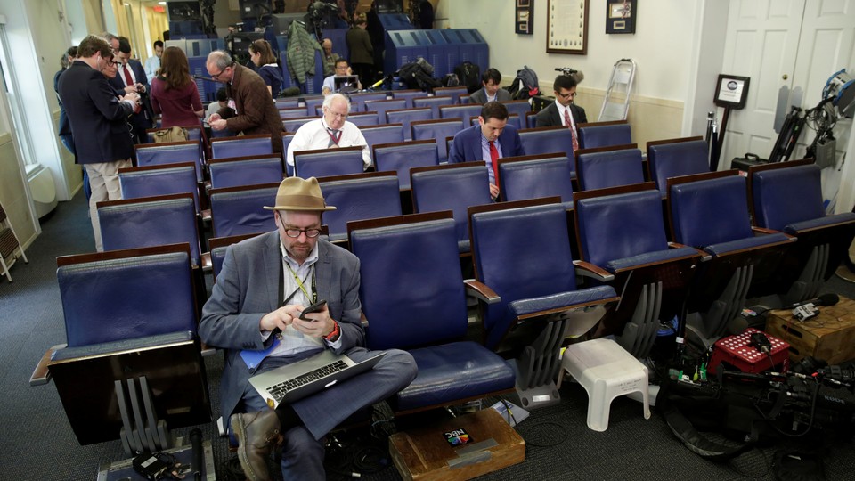 Glenn Thrush works in the White House briefing room