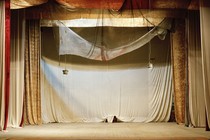 An image of an empty stage at a theatre