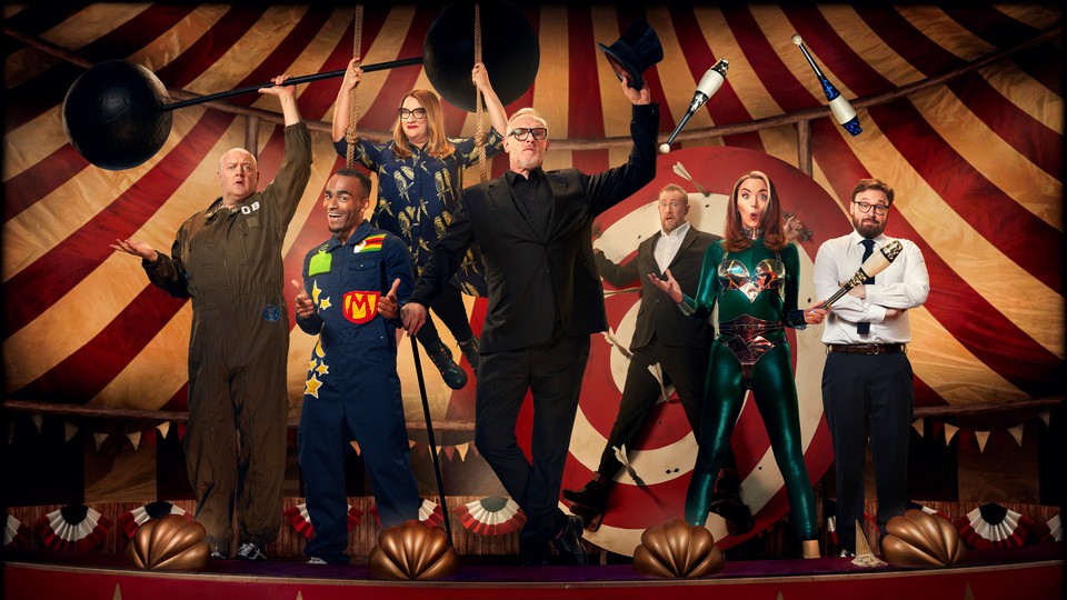 The cast of 'Taskmaster' in a circus tent, performing tricks