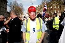 Pro-Brexit yellow vest protester in Trump mask