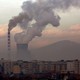A coal-fired power plant in Kosovo release smoke into the sky.