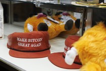 Two red "MAKE BITCOIN GREAT AGAIN" hats