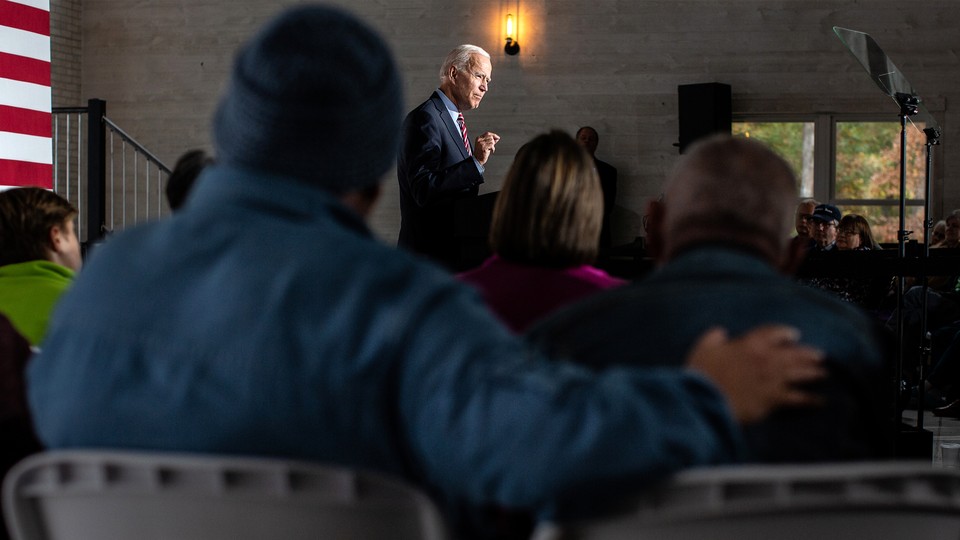 Biden speaking to a room full of people